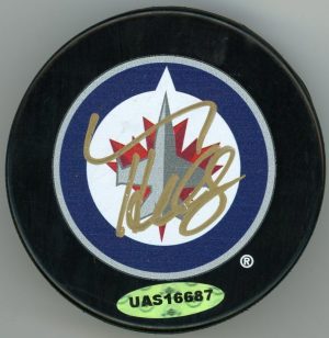 Connor Hellebuyck Jets Signed Puck
