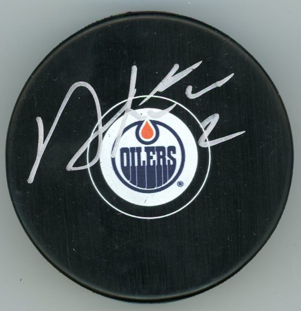 Duncan Keith Autographed Puck W/ COA