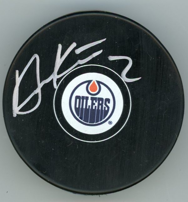Duncan Keith Autographed Puck W/ COA