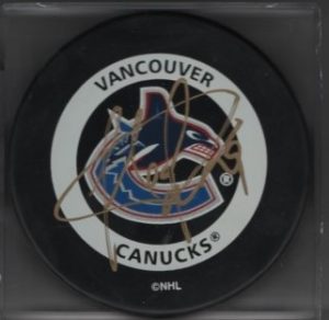 Felix Potvin Canucks Autographed Hockey Puck w/COA